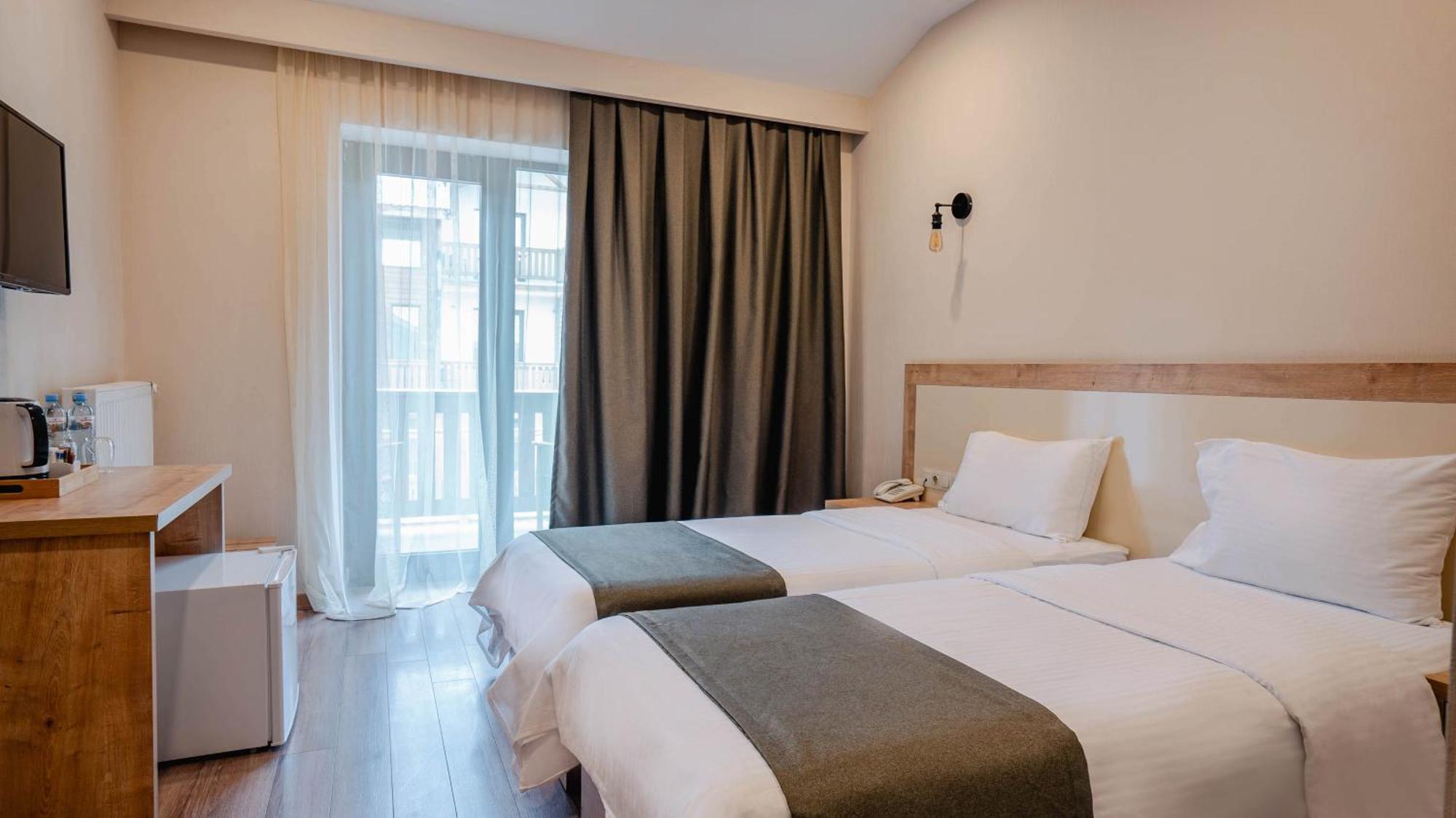 Gudauri Inn الغرفة الصورة A room at the hotel